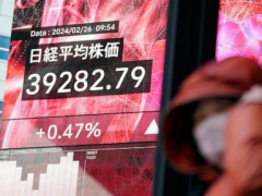 Stock market today: Asian shares primarily decrease, while Tokyo onceagain touches a record high