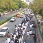 Uthenthawai trainees march versus school moving