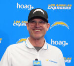 Jim Harbaugh sang the Michigan battle tune after the Chargers prepared previous Wolverine Junior Colson