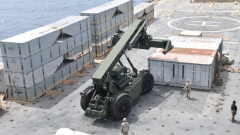 Help trucks start moving ashore bymeansof Gaza pier, U.S. states