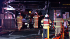 Barber store goes up in flames after being rammed by automobile in southwest Melbourne suburbanarea of Werribee