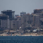 The Latest | Iran-allied militants claim an attack targeting the Israeli port city of Eilat