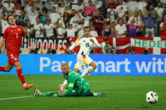 Germany weathercondition storm to beat Denmark and reach quarters