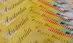 Aussie, kiwi dollars battle on China’s rate cuts; dollar adrift