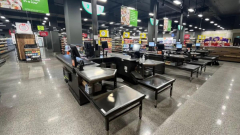 Woolworths reveals hybrid shops with mix of self-serve and manned signsup