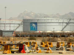 Saudi Arabia’s Aramco reports lower half-year earnings as financial concerns moisten energy costs