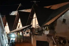 German hotel collapses, killing one; 8 others caught