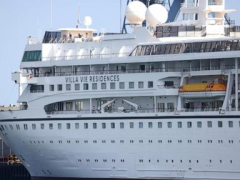 Travelers purchased berths on a 3-year cruise. Months on, the ship is still stuck in Belfast