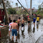 Thousands runaway homes in Vietnam as Typhoon Yagi death toll climbsup to 127