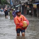 Thousands left from Hanoi as Typhoon Yagi death toll climbsup to 179