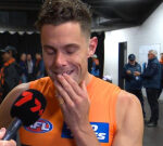 GWS Giants’ heartbreak laid bare as Aaron Cadman consoled behind live interview