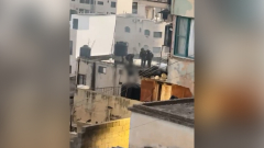 Video catches Israeli soldiers pressing dead bodies from roofingsystem