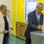 Exit survey provides Scholz’s Social Democrats a small lead over far right in German state vote