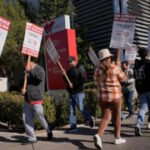 Union employees picket for 3rd day at Las Vegas gamblingestablishment with no talks slated