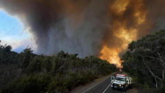 Storms may pose new fire threat after states scorched and thousands evacuated