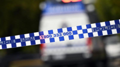 One man dead and another in custody after alleged altercation in Western Sydney