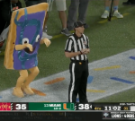 A Pop-Tarts Bowl mascot sneaking up behind a referee was nightmare fuel