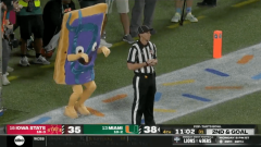 A Pop-Tarts Bowl mascot sneaking up behind a referee was nightmare fuel