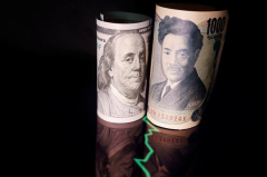 Dollar charges ahead, yen flinches lower after BOJ holds