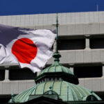 BOJ keeps interest rates steady, hawkish board member dissents