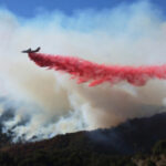 Firefighters race to beat LA blazes as winds grow and death toll hits 16