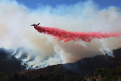 Firefighters race to beat LA blazes as winds grow and death toll hits 16