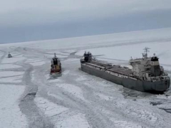 Freighter remains stuck in the ice on a frozen Lake Erie