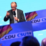 German frontrunner pledges to lead in Europe before key election