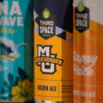 College sports put a twist on team spirit, with signature brews at games and grocers