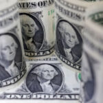 Dollar edges up from 11-week low amid soft U.S. data, tariff uncertainty