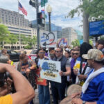 Protestors rally to support the national African American museum and Black history