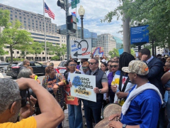 Protestors rally to support the national African American museum and Black history