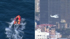 Search underway for man swept out to sea at Blue Fish Point, Manly
