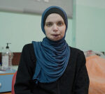 Injured Palestinian Journalist vows to keep working despite losses