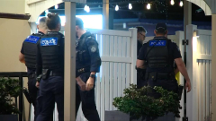 Woman allegedly armed with knife shot by police at Townsville hotel
