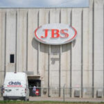 Shares of meatpacking giant JBS begin trading on the NYSE
