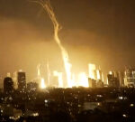 Projectile hits central Tel Aviv amid warning of Iranian retaliation