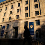 Two Chinese nationals charged for trying to recruit spies in US military