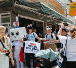 PETA distributes vegan wieners outside Nathan’s Hot Dog Eating Contest