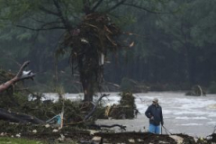 14 children in Texas are among the 37 dead from flash floods as the search continues for the missing