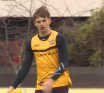 Luke Hodge answers burning question as son Cooper joins Hawks training