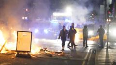 Fireworks and bottles thrown at police as Ballymena violence flares for second night