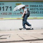 Asian markets mixed and Japan’s shares slip after election leaves PM future in doubt