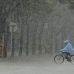 Heavy rains kill four in China as flood warnings issued in 11 provinces