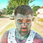 British man claims he’s unable to watch porn as tattoos confuse age check system