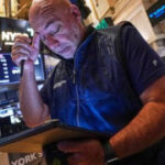 Asian shares trade mostly higher after stocks on Wall Street extend losses