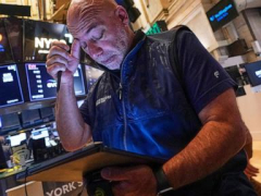Asian shares trade mostly higher after stocks on Wall Street extend losses