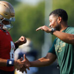 See Notre Dame head coach Marcus Freeman wearing ‘The Shirt’ during Wednesday’s practice