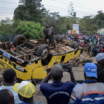 Bus carrying mourners overturns in Kenya, killing 21 people