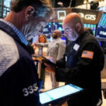 Wall Street finishes its latest winning week with a fade